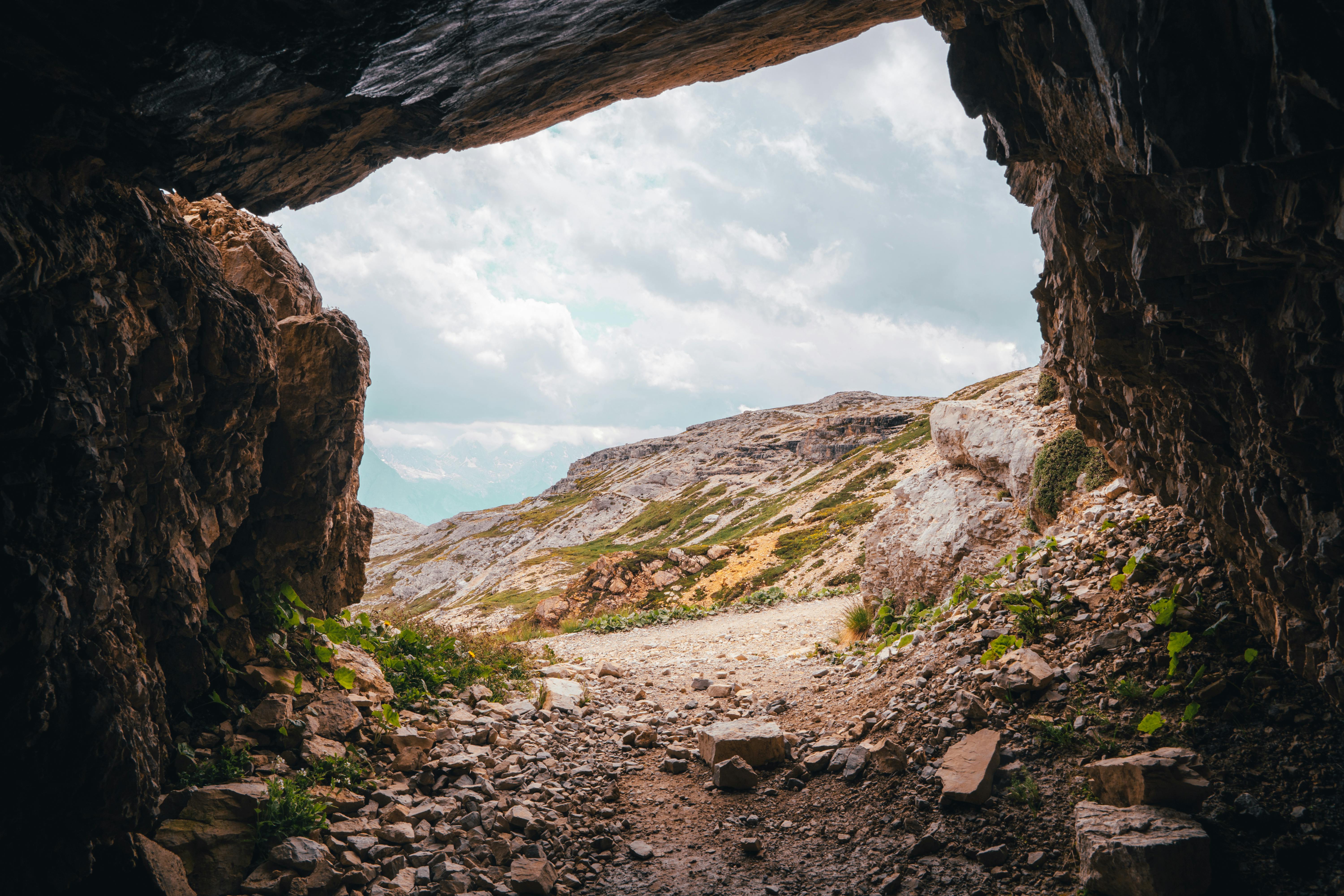 Free A View of a Landscape from Inside a Cave Stock Photo