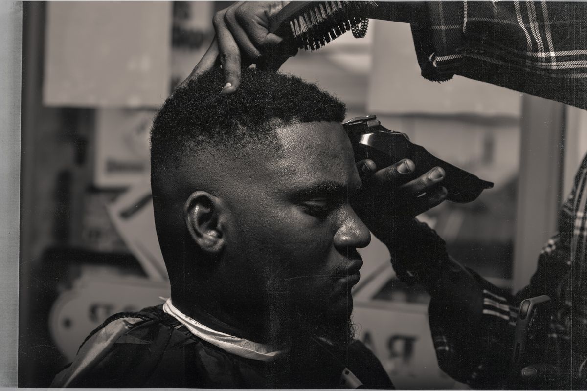 Barber giving a haircut