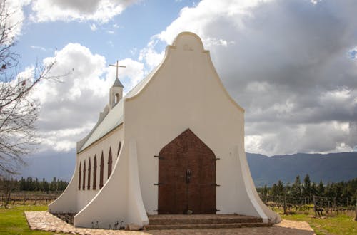 Free White Church in Mountains  Stock Photo