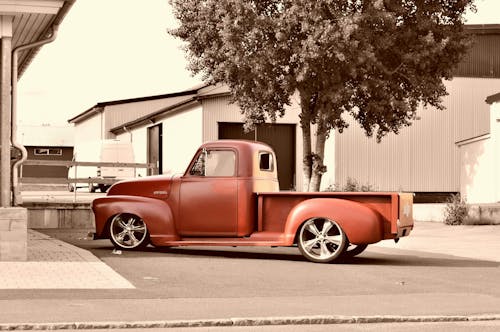 Red 2-door Truck Near Tree