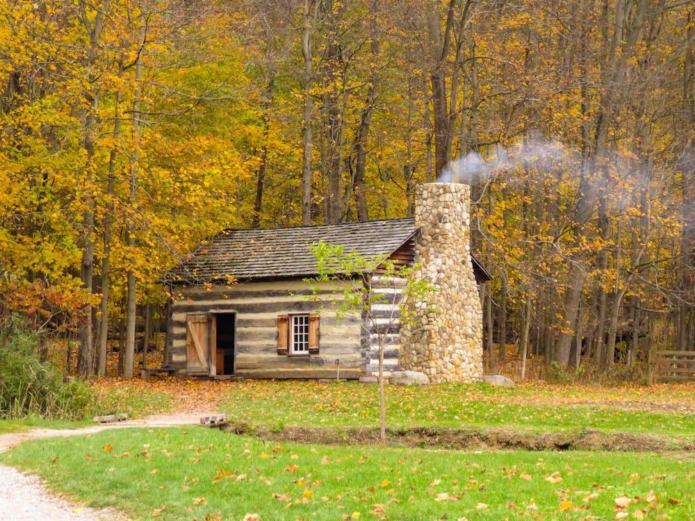 An image showing smoke coming out of a well-functioning chimney