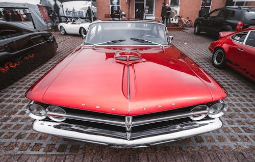 Free Red Pontiac Car Parked on Street Stock Photo