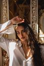 A Woman in White Button Up Shirt