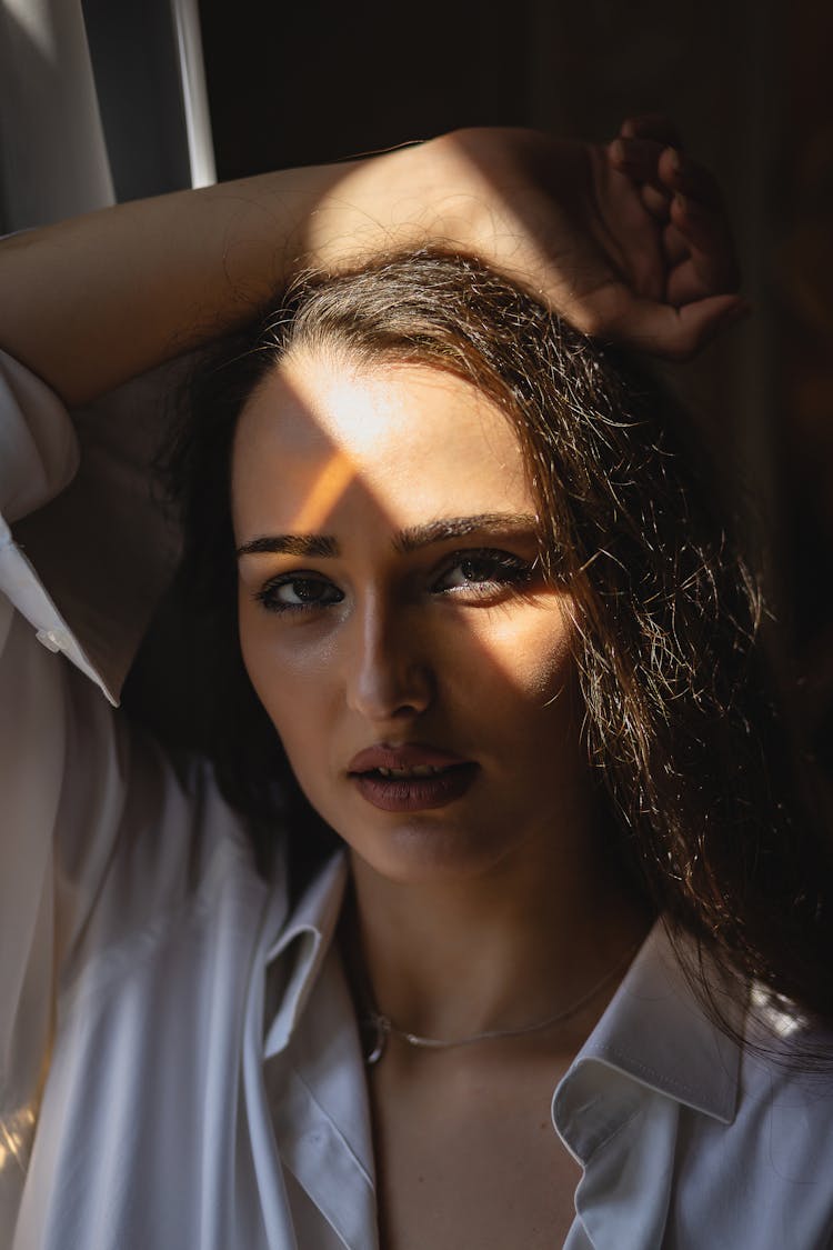 Portrait Of A Woman In White Collared Shirt