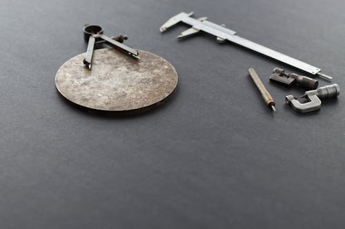 Free Measuring Instruments on a Black Surface Stock Photo