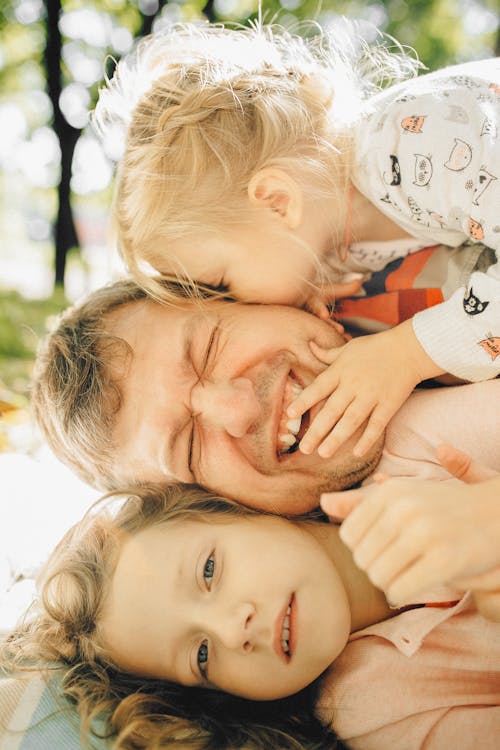 Free Happy Father with his Daughters  Stock Photo