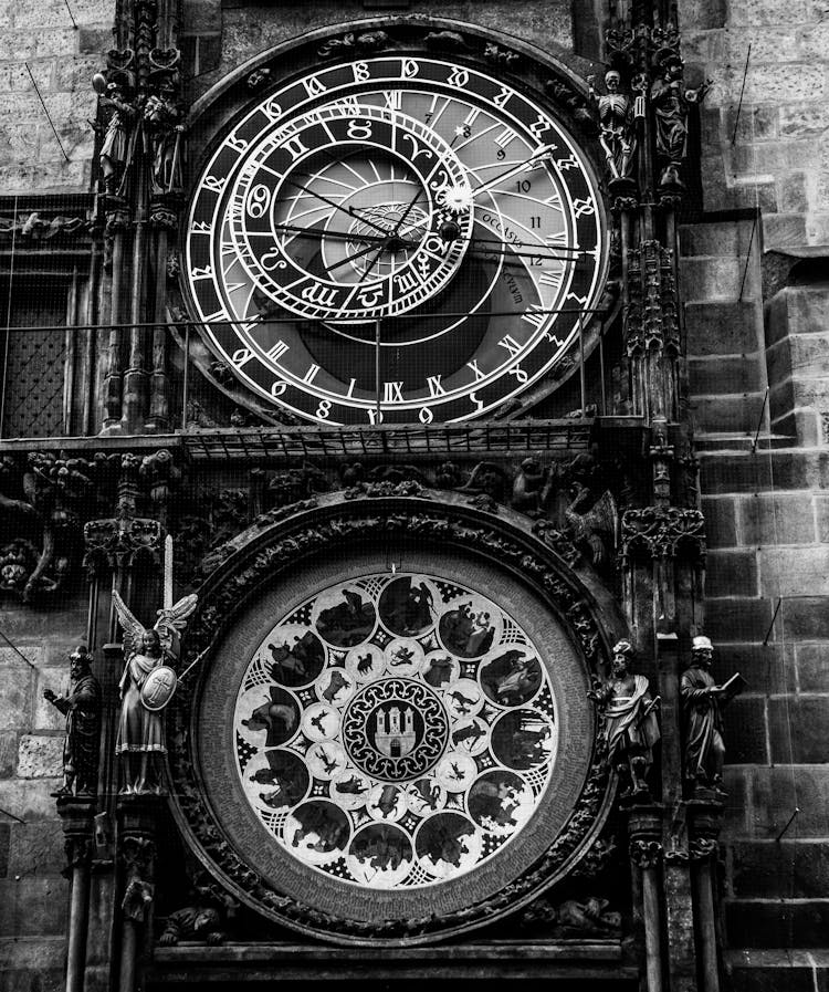 Ornamented Clocks On Building