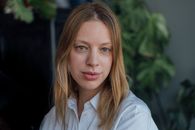 Woman in White Button Up Shirt