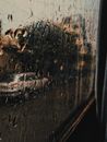Water Droplets on Glass Window