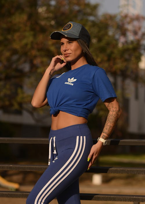 Fit Woman in Sportswear Posing Outdoors