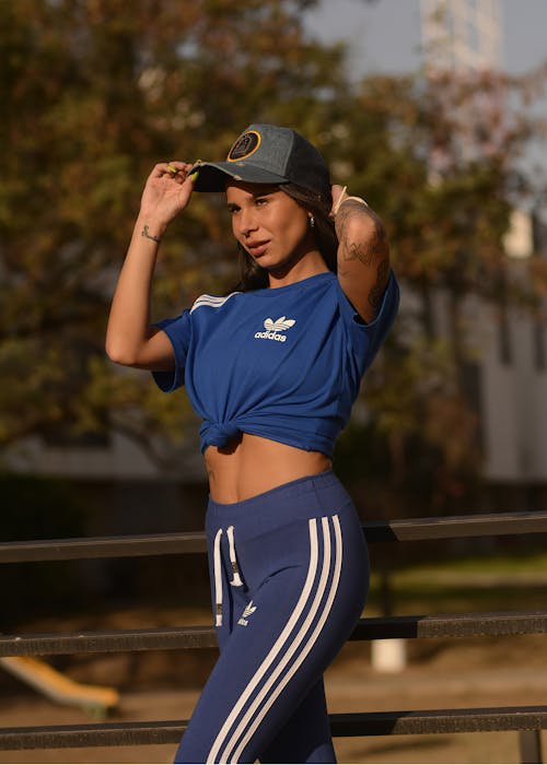 Woman in Adidas T-shirt and Trousers