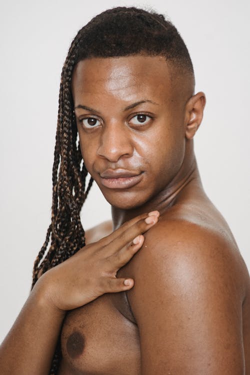 Eccentric black man in white background