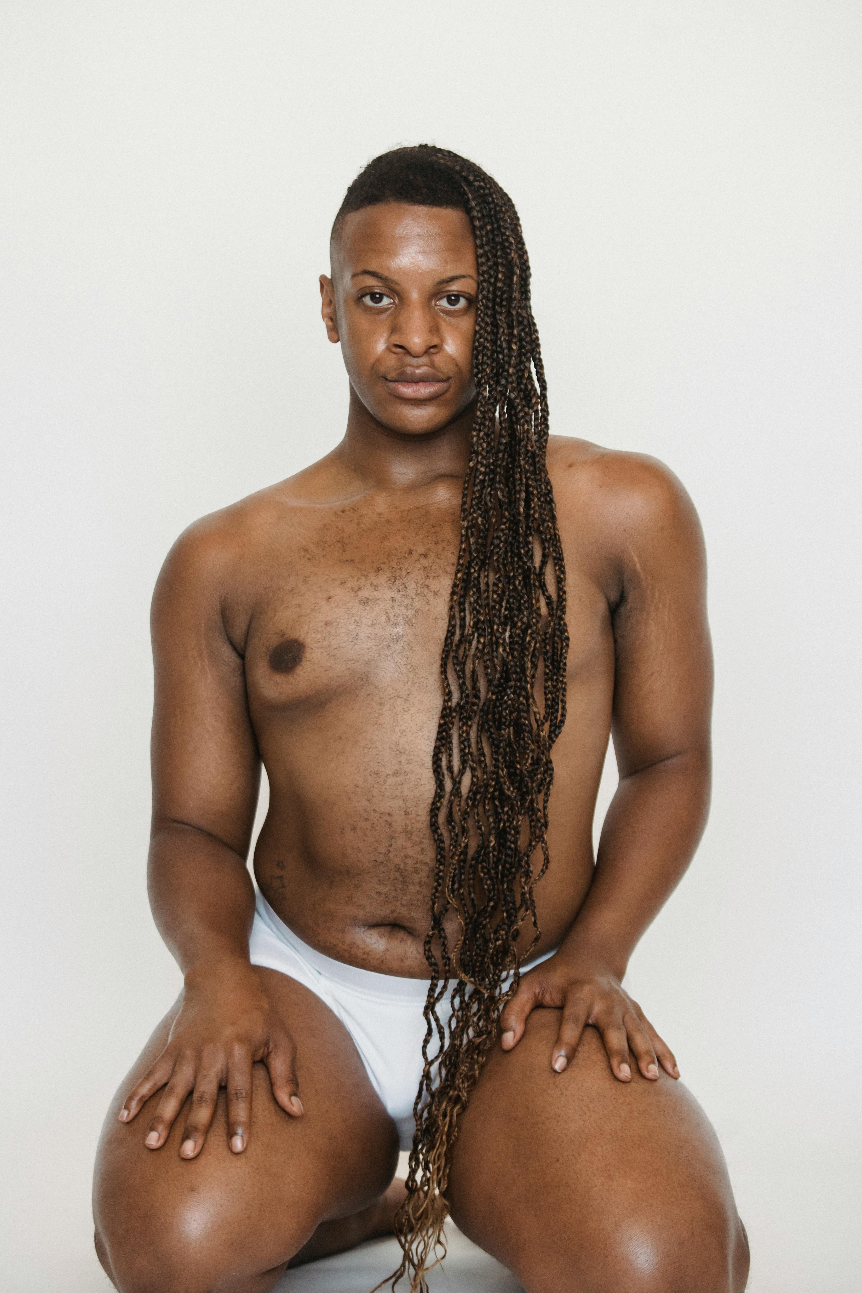 Transgender black man in underwear with Afro braids · Free Stock Photo picture image photo