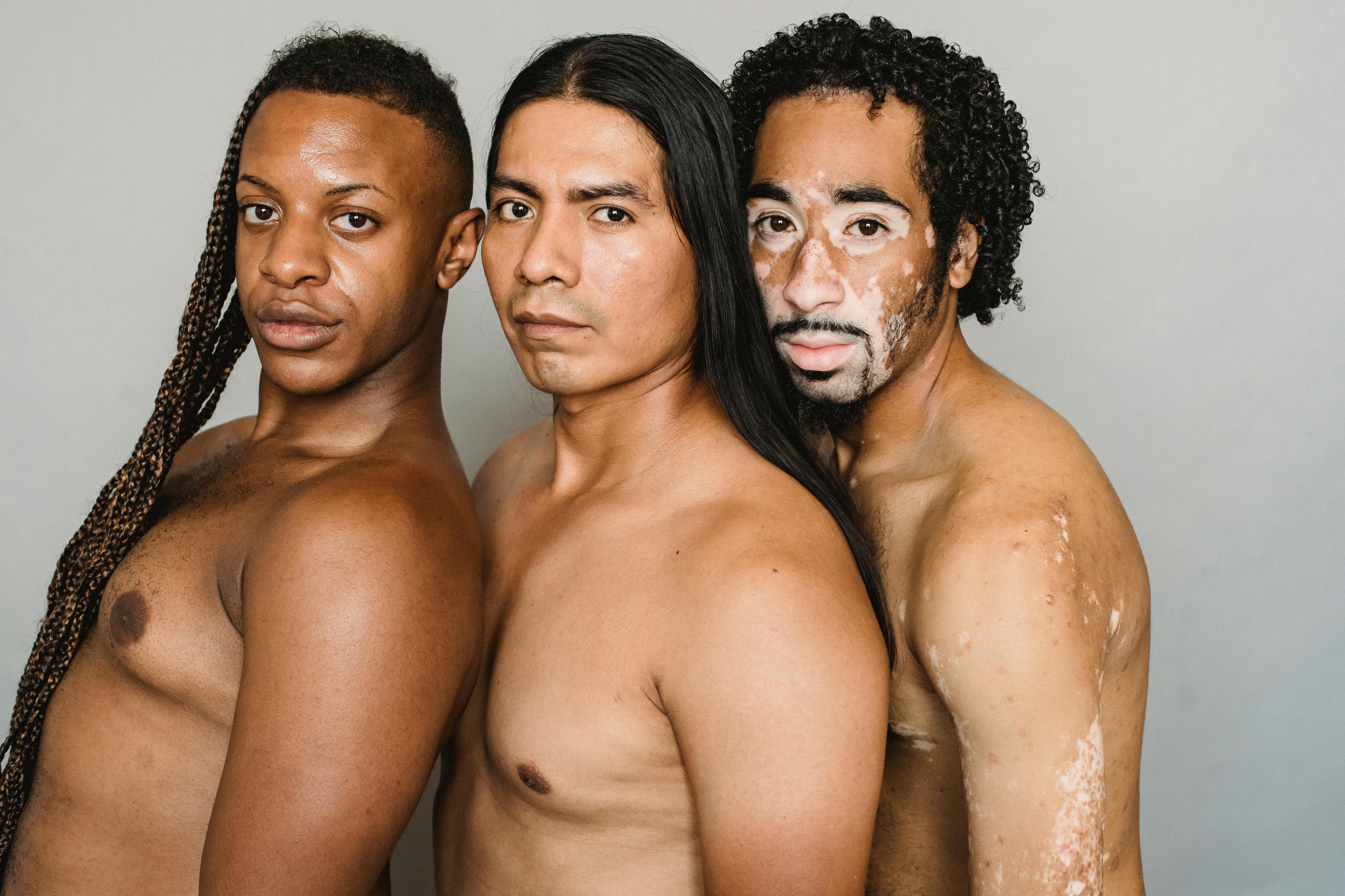 multiracial transgender friends with naked torso in studio