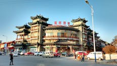 Cars and People on a Commercial Area