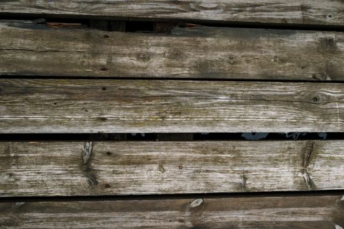 Free Close-up of rustic wooden planks with a natural texture, ideal for backgrounds. Stock Photo