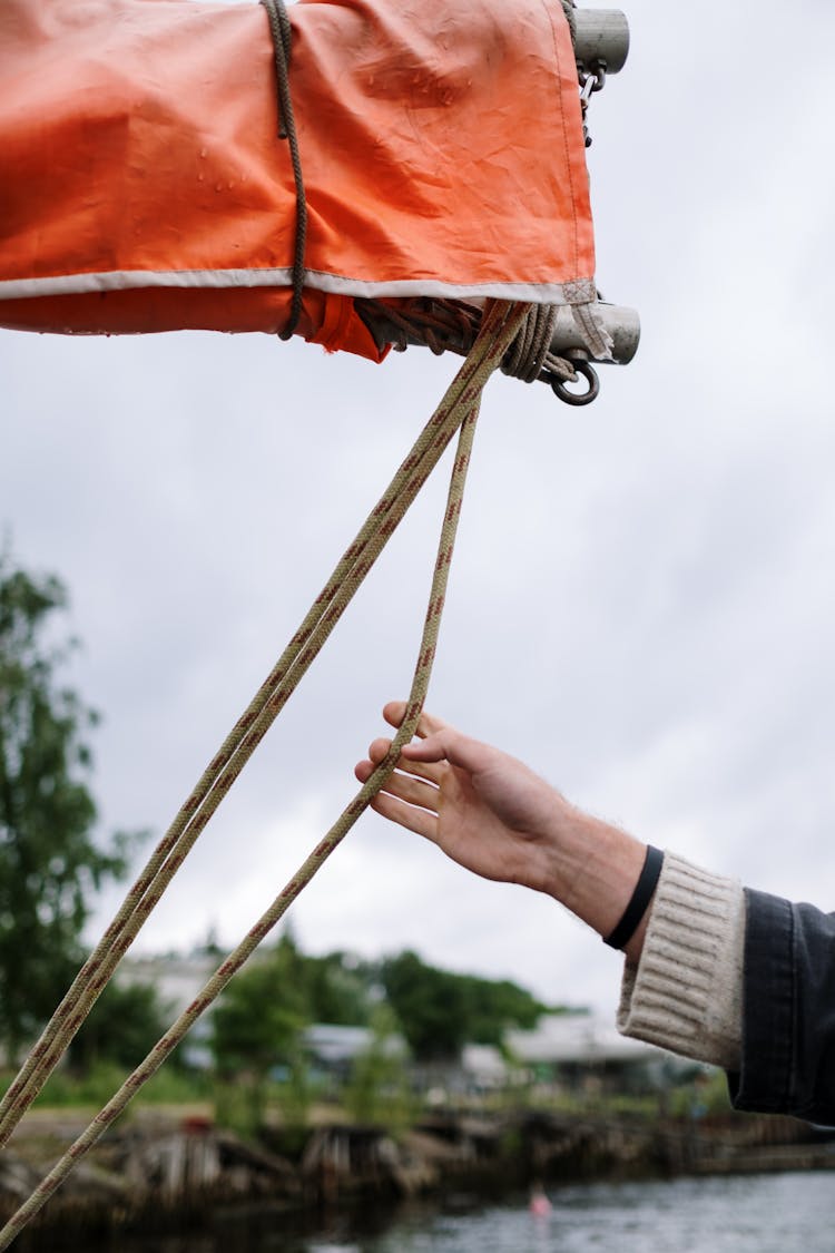 Hand Holding Rope 