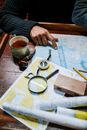 Person Holding Black Magnifying Glass