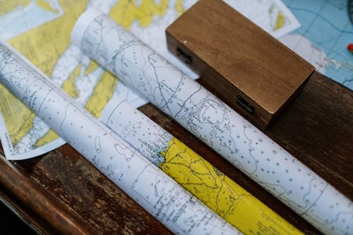 Close-up Photo of Rolled Maps 