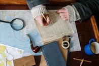 Person Holding Brown Wooden Rolling Pin