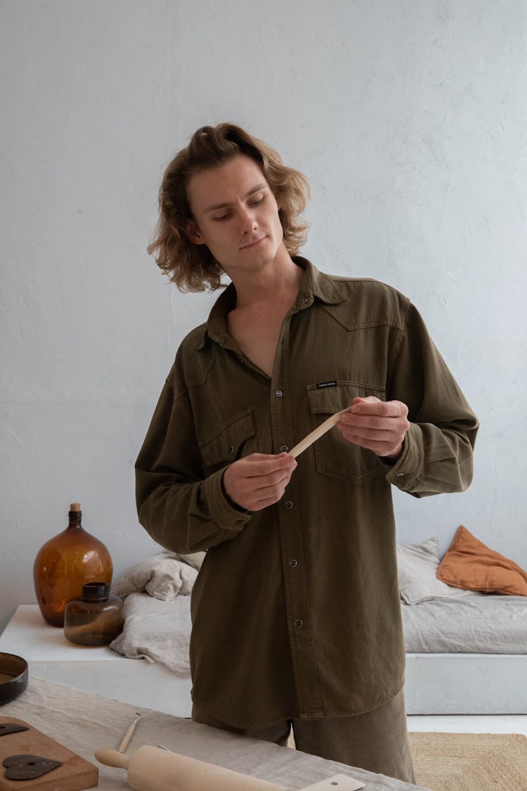 Young Handsome Man Working At Home