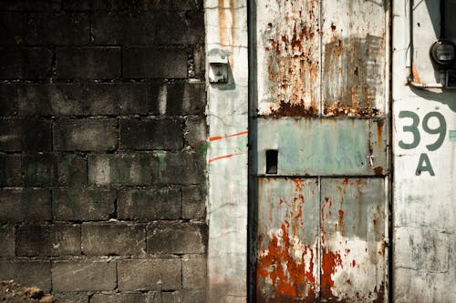 Rusty Door of Derelict Building