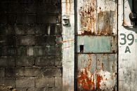 White Wooden Door With Gray Brick Wall