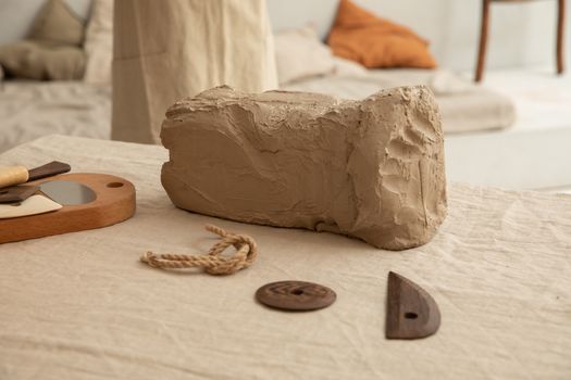 Chunk of clay on workbench