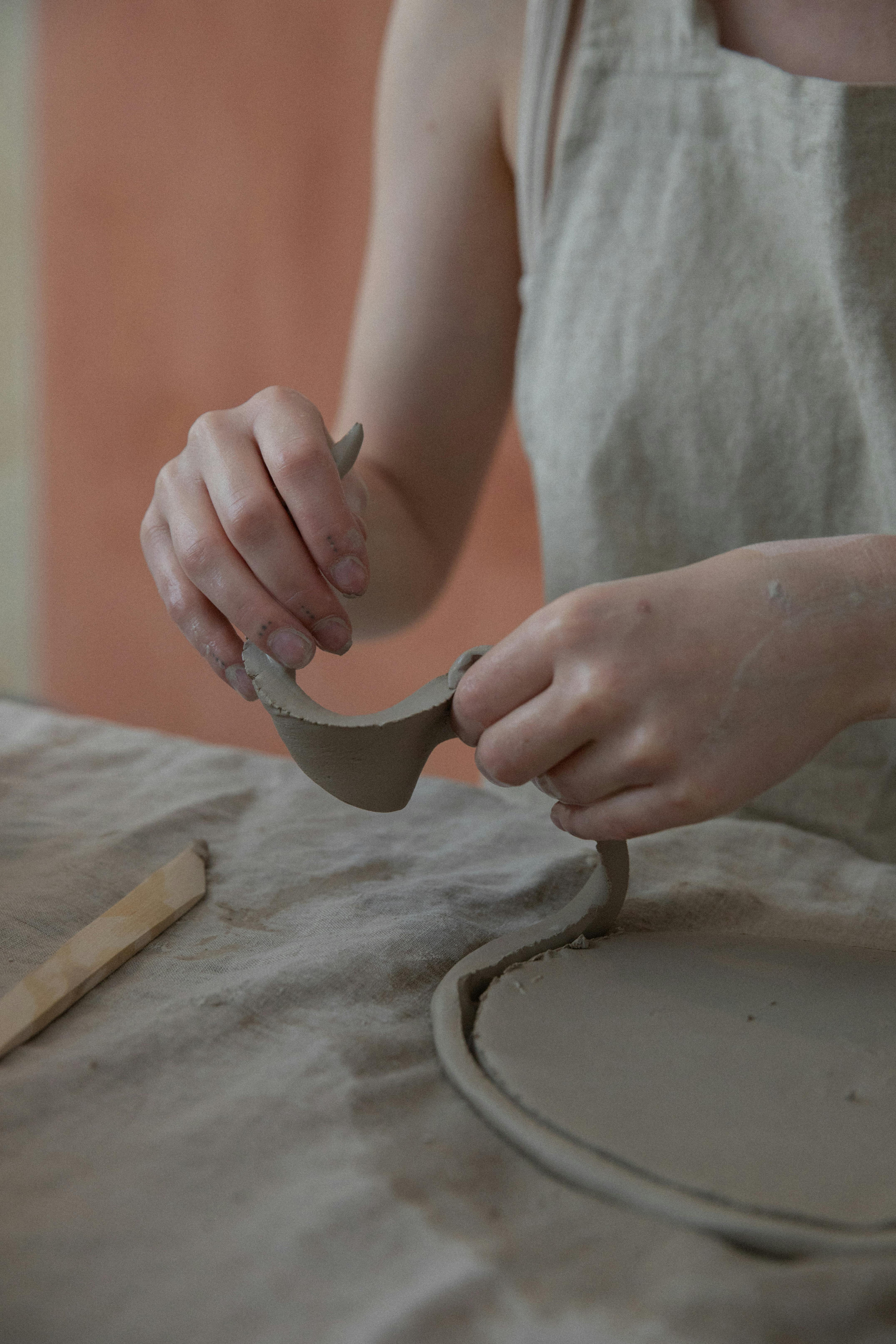 crop artisan creating clay crockery