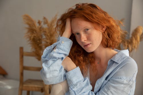 Charming young woman relaxing at home