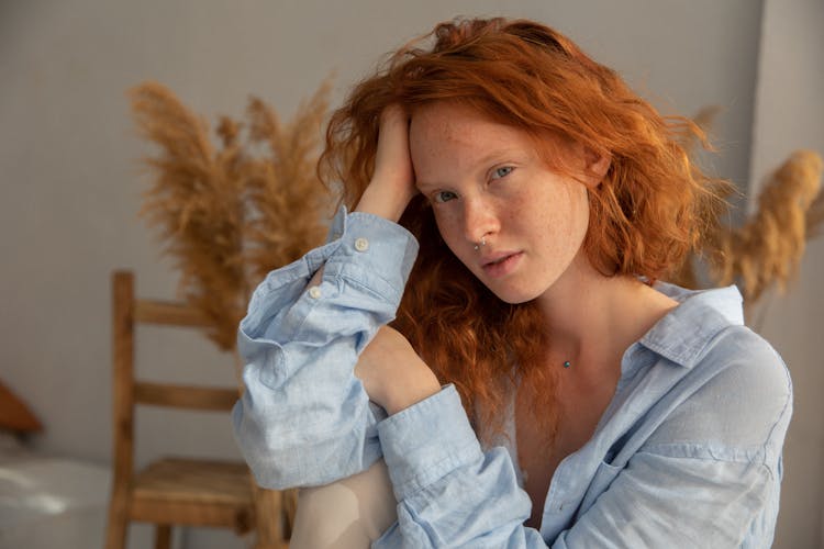 Charming Young Woman Relaxing At Home