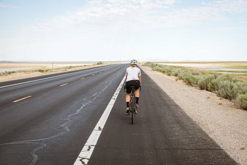 Foto d'estoc gratuïta de afició, bicicleta de carretera, carretera