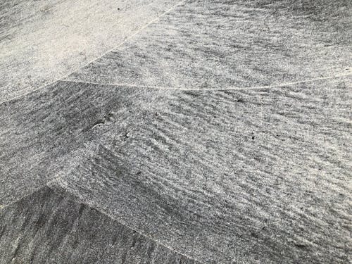 
A Grayscale Aerial Shot of a Desert