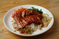 Cooked Meat Slices on Top of Rice