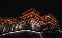 Low Angle Shot of Chinese Temple Under Night Sky