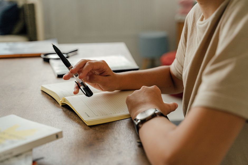 journal and lamp on desk real home lifestyle photo 1