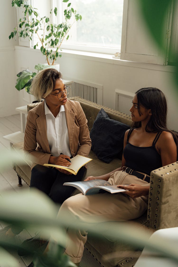 A Professor Talking To Her Student