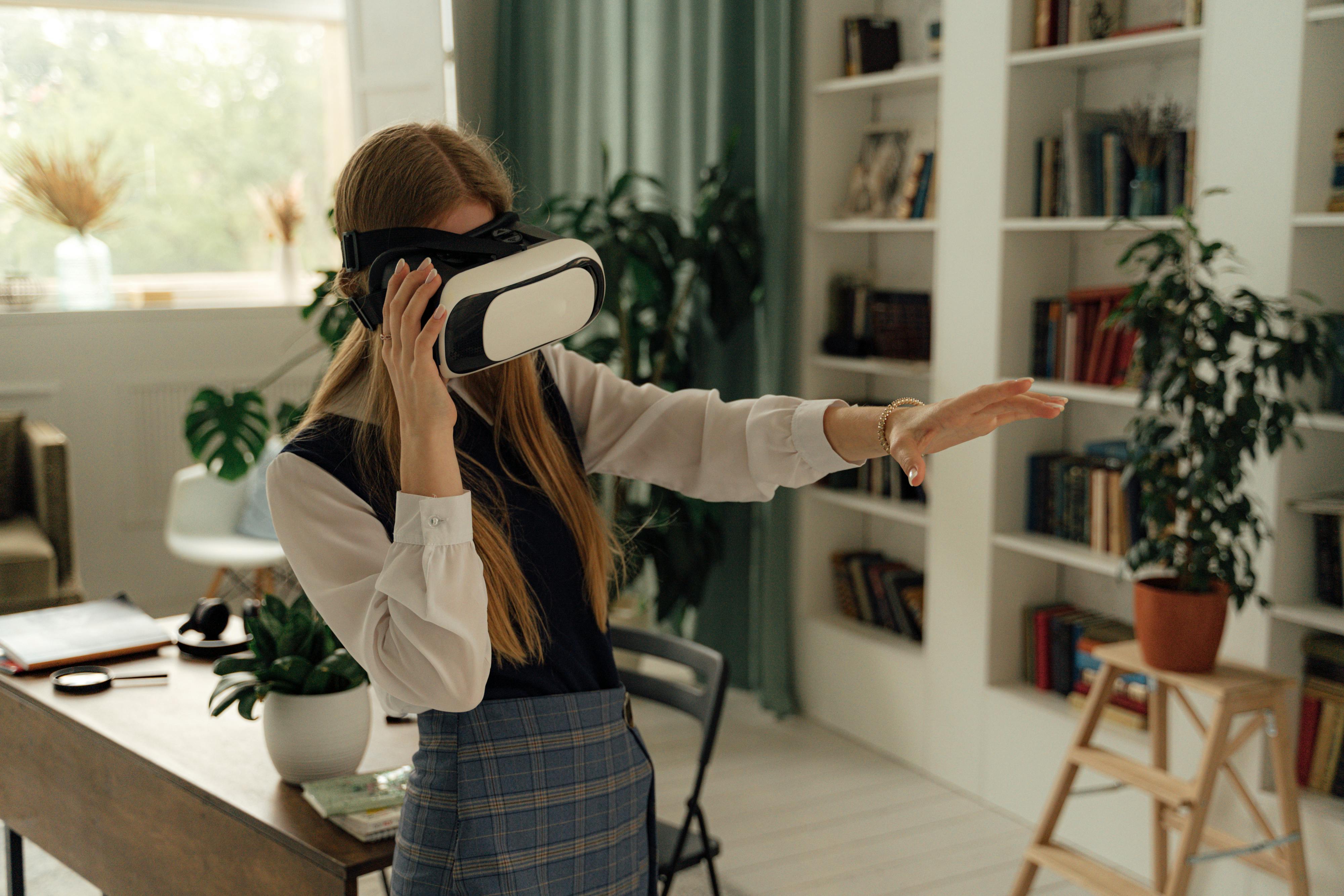 girl in school uniform playing a virtual reality video game