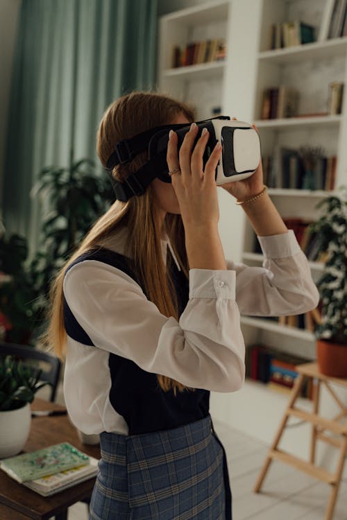 Girl in School Uniform Playing a Virtual Reality Video Game