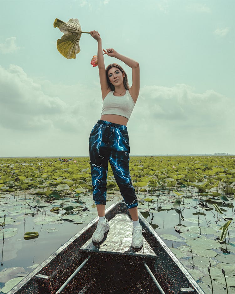 Happy Slim Woman Waving Leaf Of Lotus