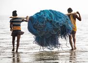 Fishermen Carrying Fishing Nets