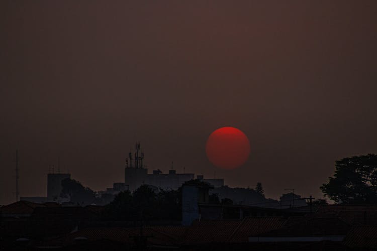 Calm Sunset Sky Over City Roofs