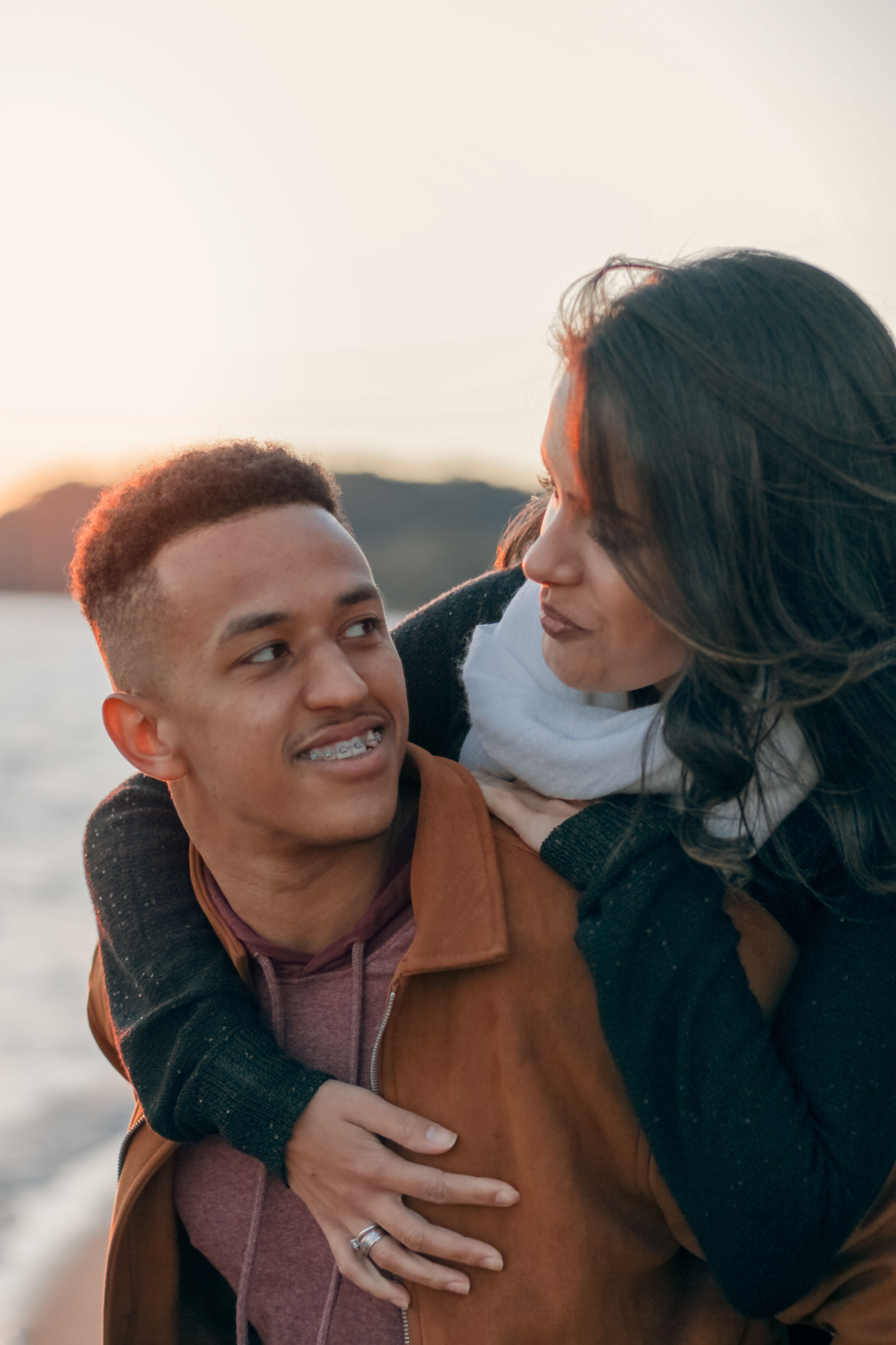 Woman Hugging a Man from Behind · Free Stock Photo