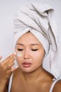 Woman With White Towel on Her Head