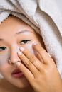 Woman Covering Her Face With White Textile