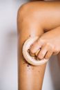 Person With White Cream on Her Right Hand