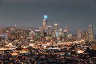 Illuminated night cityscape with bright streetlights