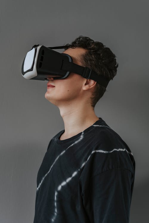 A Man in Black Shirt Wearing VR Headset