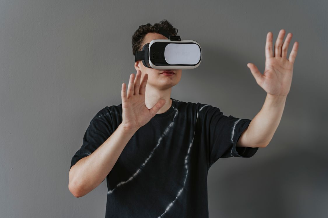 Man Virtual Reality Man in T-shirt Wearing White and Black Virtual Reality Box · Free Stock ...