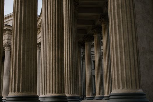 Ornate stone columns in a historic building showcasing classical architecture.